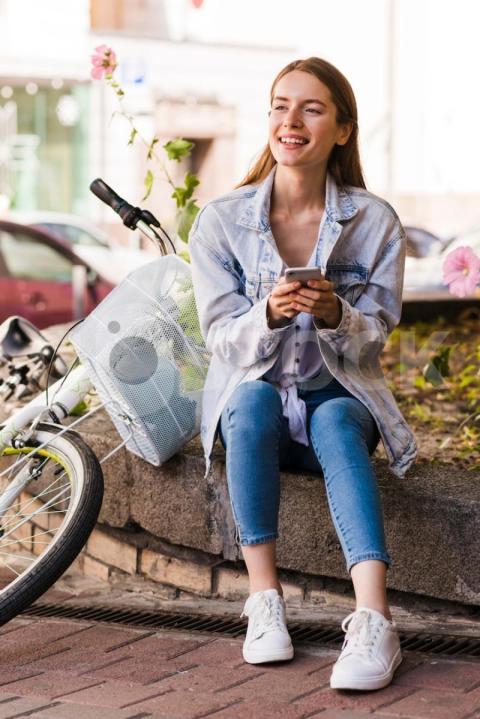 Woman sitting her bike 23 2148232106 jpg